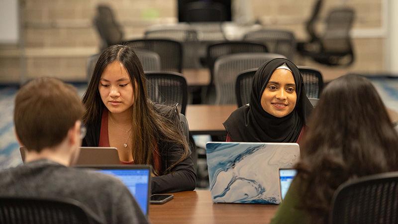 Penn State Brandywine students in Vairo Library studying